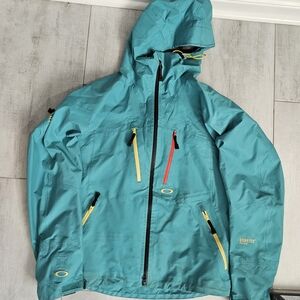 Oakley Teal Jacket with Yellow and Red Accents